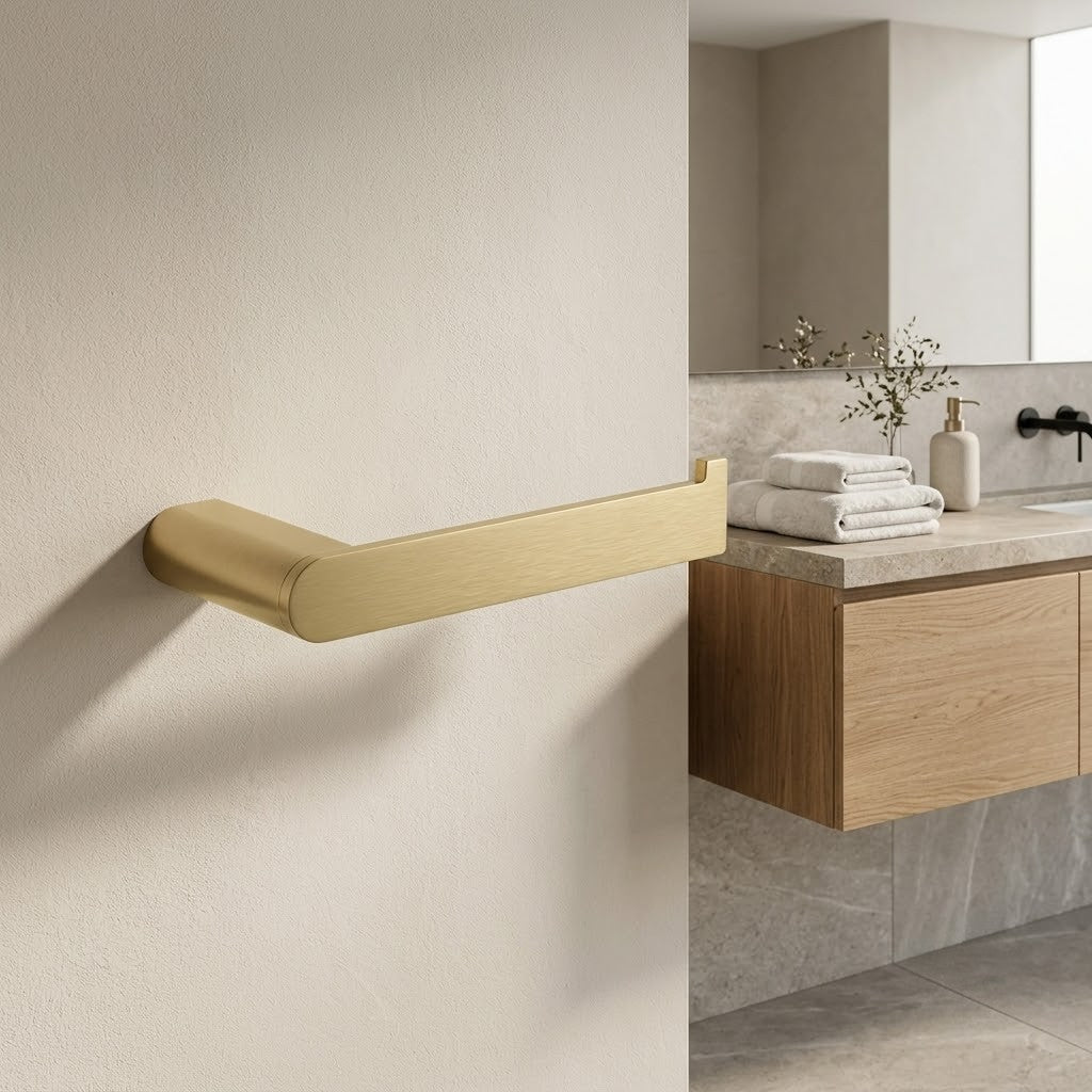Luxen Paper Holder in Brushed Aurum, installed