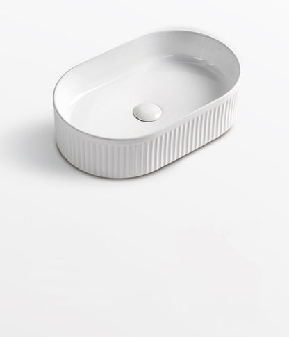 490 x 310 x 130mm Oval Matte White Fluted Above Counter Ceramic Basin
