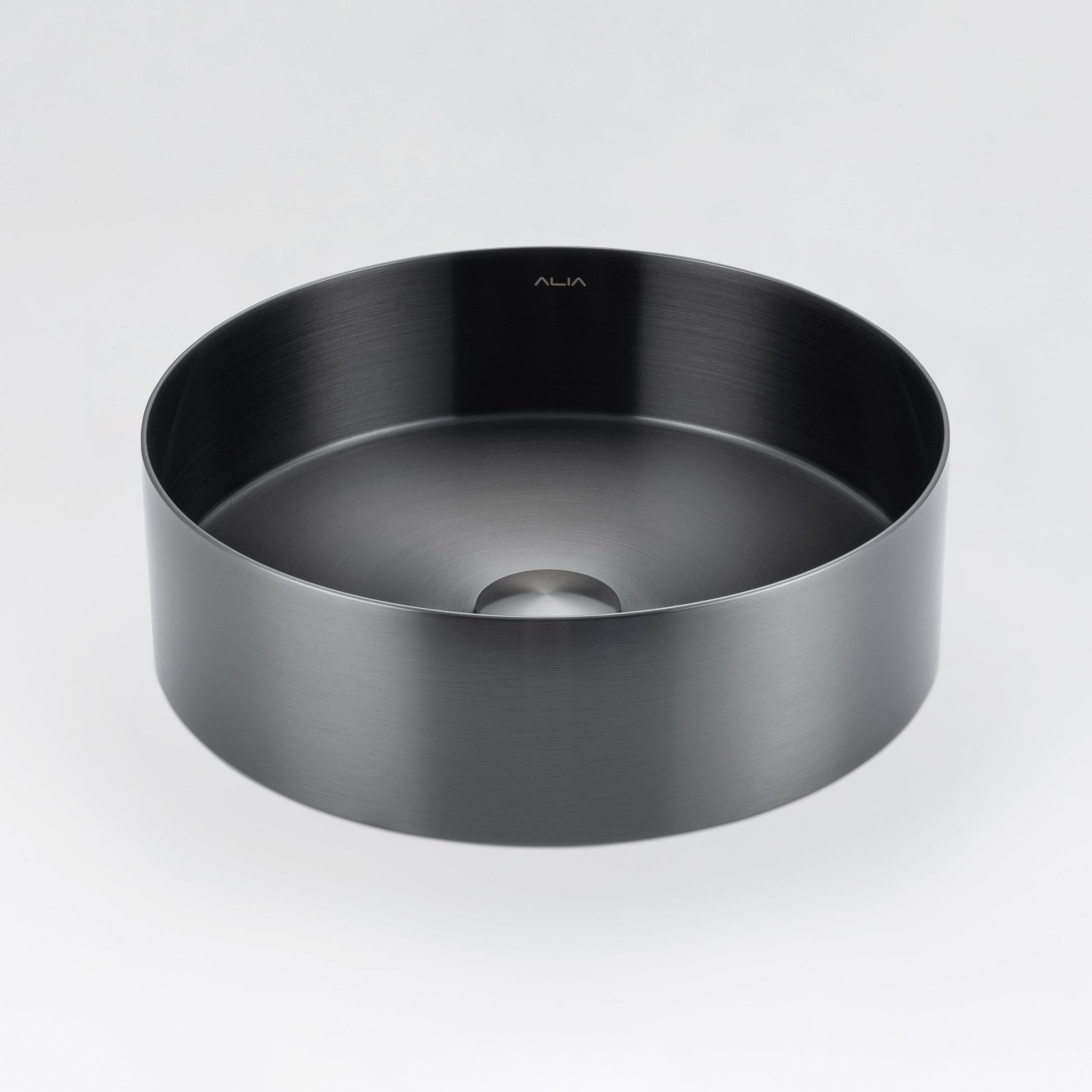 Modern ALIA above-counter bathroom basin featuring sleek gunmetal grey stainless steel for a premium look. Black round sink on a light grey background.